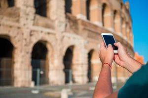 Closeup smartphone background of Great Colosseum, Rome, Italy photo