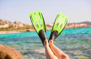 Close-up of fins in the turquoise water photo