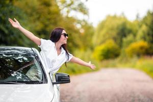 Young woman tourist enjoying on summer vacation photo