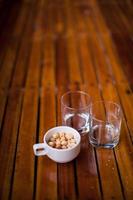 Nuts and two glasses on the bar outdoors photo