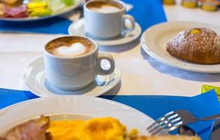 Delicious and tasty cappuccino for breakfast at a cafe photo