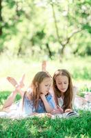 Two little kids on picnic in the park photo
