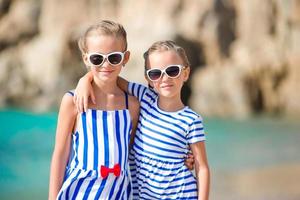 Adorable little girls on summer vacation in Europe photo