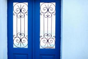 Typical blue door with stairs. Santorini island, Greece photo