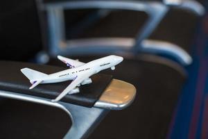 Small airplane model inside a large aircraft photo