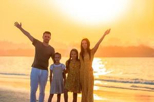 Young family on vacation at the evening photo