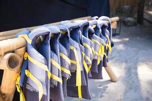 Gree lifejackets on the white beach photo