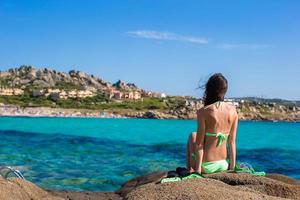 Young woman with snorkeling equipment ready for swimming photo