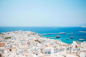 View of traditional greek village with white houses on Mykonos Island, Greece, photo