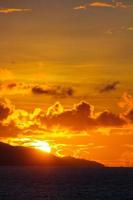 Amazing colorful sunset on an exotic beach in Seychelles photo