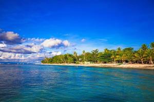 Landscape of tropical island beach with perfect blue sky in Bohol photo