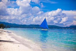 Small boat in open sea on the island of Boracay photo