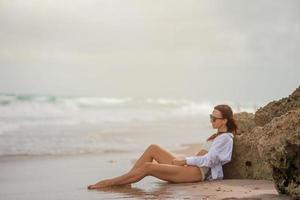 Young beautiful woman relax on the beach photo