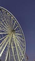 Ferris wheel in the park at the Downtown Miami at sunset photo