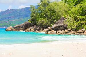 Landscape of beautiful exotic tropical beach at Seychelle island photo