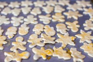 Christmas gingerbread men on a baking photo