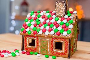 Candy ginger house background Christmas tree lights photo