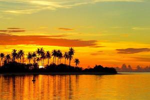 Beautiful colorful sunset at tropical island on Maldives in Indian Ocean
