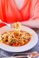 Spaghetti a la Bolognese in the white plate. photo