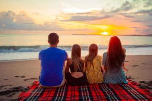 Young family on vacation at the evening photo