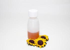 plain syrup cough medicine with white background, Close up photo of cough white bottles