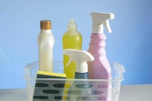 basket with cleaning products for home hygiene use photo