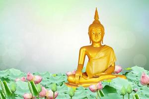 Makha Asanaha Visakha Bucha Day Golden Buddha image. Background of Bodhi leaves with shining light. Soft image and smooth focus style photo