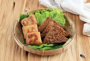 Tahu Tempe Bacem. Tofu and Tempeh with Sweet Spices. photo