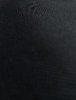 Black fabric textile textured background photo