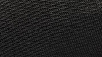 Black fabric textile textured background photo