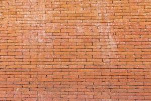 Red brick wall made of stone, Brick wall background photo