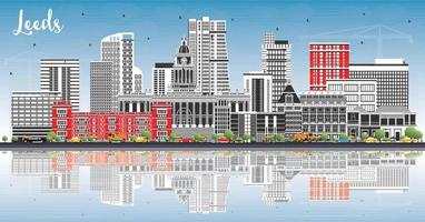 Leeds UK City Skyline with Color Buildings, Blue Sky and Reflections. vector