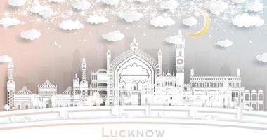 El horizonte de la ciudad de lucknow india en estilo de corte de papel con edificios blancos, luna y guirnaldas de neón. vector