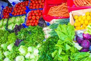 Fruits and vegetables at a farmers market photo