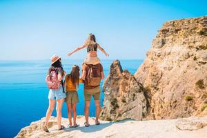 Happy family on vacation in the mountains photo