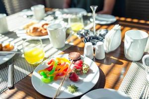 Fresh and delisious breakfast in outdoor cafe photo