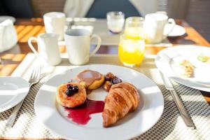 Fresh and delisious breakfast in outdoor cafe photo