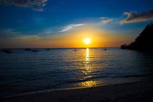 Colorful bright sunset on the island Boracay, Philippines photo