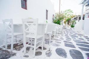 Summer empty openair cafe in popular area in Mykonos Little Venice photo