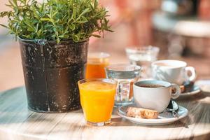 Fresh and delisious breakfast in outdoor cafe at european city photo