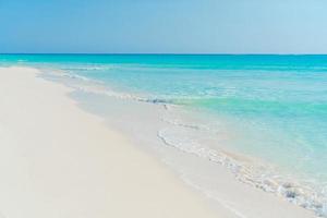 Perfect white sandy beach with turquoise water photo