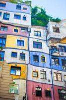 Hundertwasser house with a garden upstairs in Vienna, Austria photo