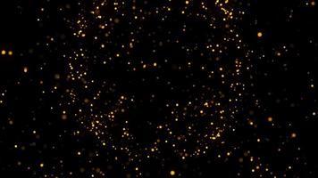 partículas de explosão brilham em fundo preto. energia de partículas de explosão. fundo de movimento 4k. video