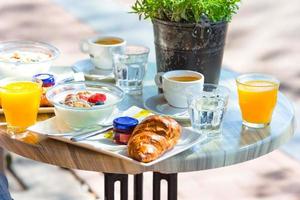 Fresh and delisious breakfast in outdoor cafe at european city photo