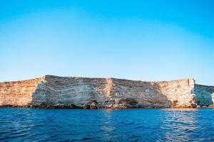 Beautiful seascape. Amazing composition of nature with mountains and cliffs. photo