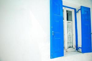 Traditional houses in the narrow streets of Mykonos, Greece. photo