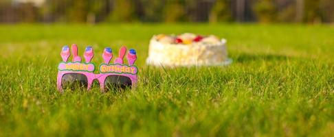 Birthday cake and glasses that says a Happy Birthday photo