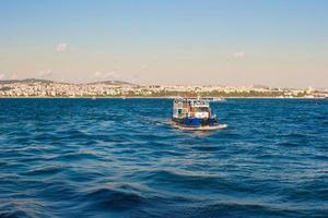 Small ship in Bosporus Strait in Turkey photo