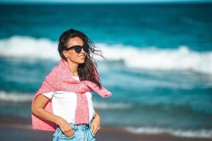 Young beautiful woman on the beach vacation photo