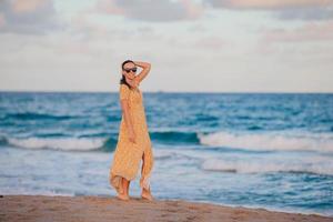 Young beautiful woman on the beach vacation photo